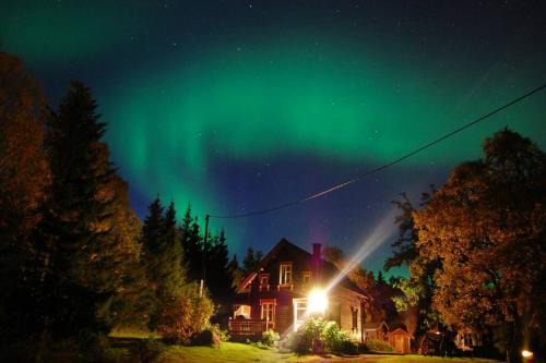 Kvaloya House | 100 Years Old Norwegian Log House in Tromsø