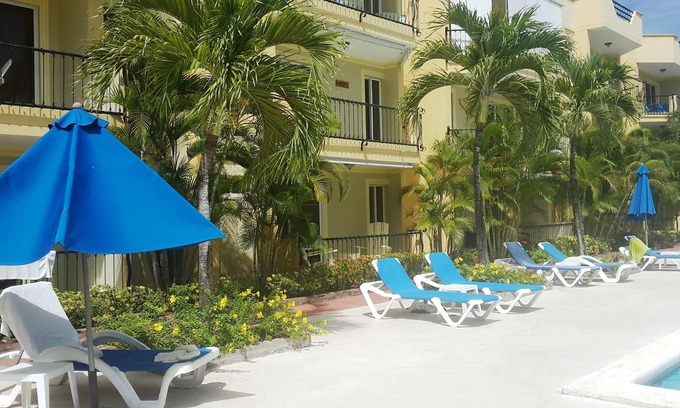El Batey Apartment | 1BD guest-friendly condo near everything, with pool, wifi, cable TV