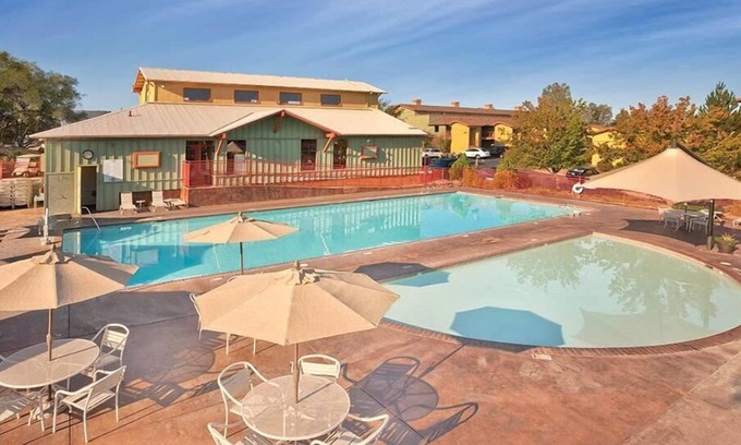 Angels Camp Condo | 1br Condo Lounge in pool w/Wine From Local Vineyards!