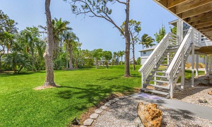 Pine Island Center House | 2/2 Heart of Pine Island Home, with Wrap Around Porch!