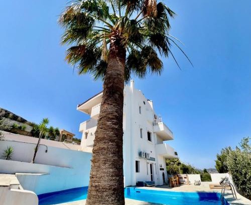 Palaia Fokaia Apartment | 2 bedroom self-contained apartment and swimming pool at Palm Tree Villa