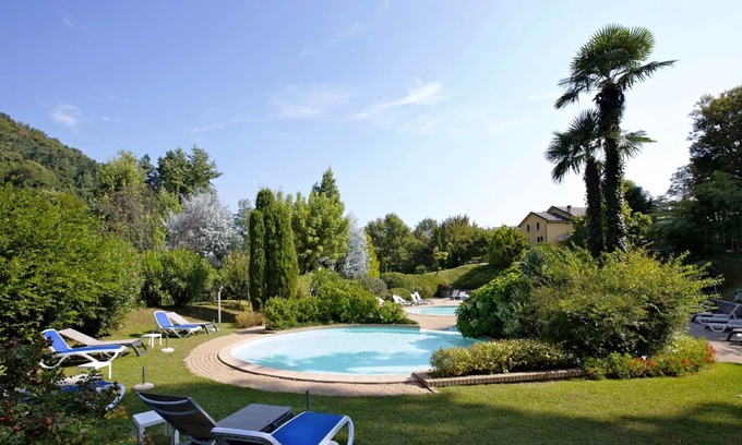 Susello Apartment | 2-room corner apartment in an exceptional residence with approx. 8 ha. large park and pool