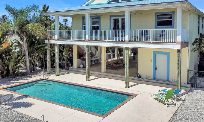 Saint James City House | 3 bed, 3 bath home, heated/cooled pool on quiet canal. Quick boat access to gulf