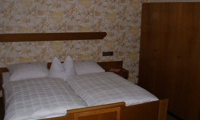 Schoenmuenzach Bed & Breakfast | 4 bed room 1 - Adieu Everyday life: Pension Oesterle in the Black Forest
