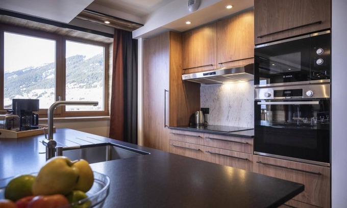 Lanslevillard Apartment | 50m from ski slopes, fitness, swimming pool, sauna, hammam, balcony, fireplace or stove, tv