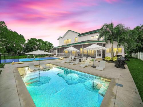 Sebring House | 6BR Lakefront Home w Pool Pickleball More
