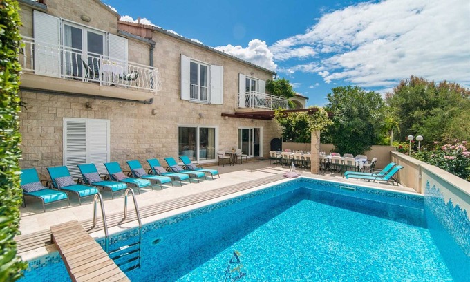 Mirce Villa | 7-BR Beachfront Villa with Seaside Terrace and Heated Swimming Pool