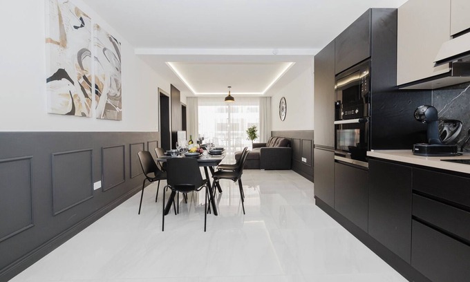 Qawra Apartment | A bright and spacious 2-bedroom apartment in Qawra with a large balcony, modern kitchen, and cozy bedrooms — the perfect base for a relaxing stay by the sea.