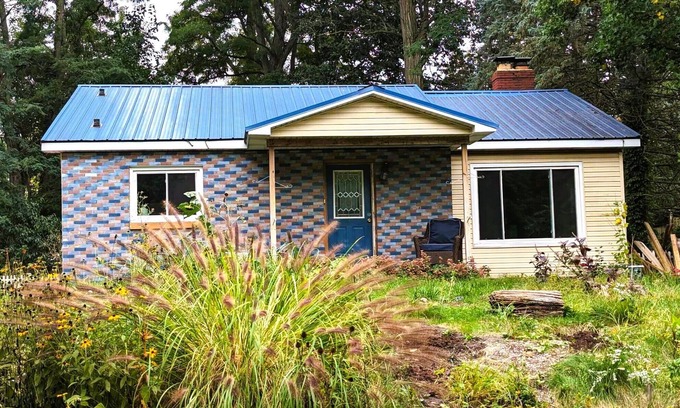 Pottawattamie Park House | A cozy little house along Trail Creek awaits you. Relax. Unwind. Enjoy.