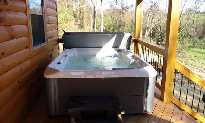 Carbon Hill Cabin | A cozy new cabin in rural setting with a hot tub on porch. Beautiful rural view.