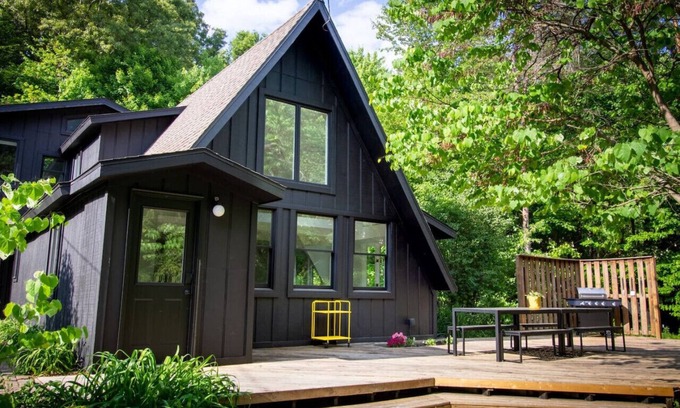 Lowell House | A-Frame Cabin in the woods with pool & firepit that sleeps 19 in Ada, MI (Pet Friendly!)