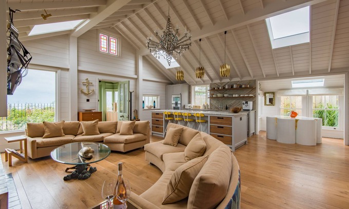 Deal House | A luxurious waters-edge holiday home by the sea sleeping 11 right on the beach