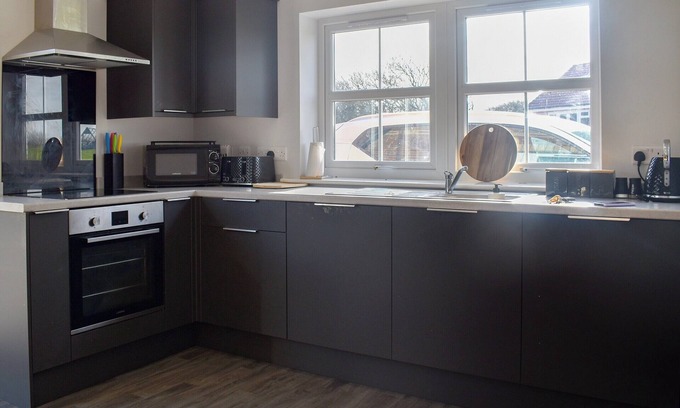 Newport Cottage | A modern, semi-detached house set in a rural location.