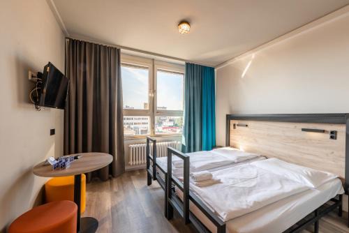 Auf der Prag Hotel | a&o Stuttgart City