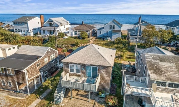 Rockport Cottage | Adorable Beach house with lots of outdoor space and steps to Long Beach!