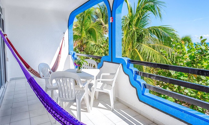 Akumal Condo | Affordable right on the beach! Beautiful colorful setting!