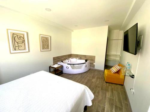 Banos de Agua Santa Apartment | AHAVAH SUITES