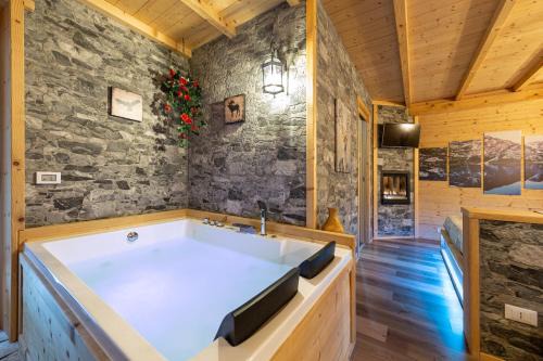 Pieve di Cadore Apartment | AL RANCH Cadore Wellness Dolomiti Apartments vicino Cortina Olimpiadi 2026 e Misurina Tre Cime Lavaredo