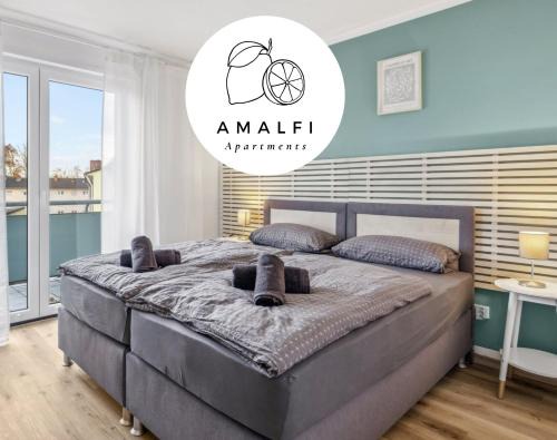 Kaiserslautern Apartment | Amalfi A02 - 2 Zi für 4P - Balkon, smart TV, Boxspringbett