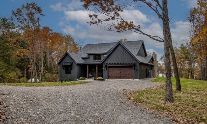 Valois House | Among the Oaks: Newly built Luxury home with game room, wooded setting overlooking Seneca lake