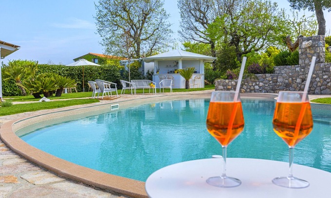 Sant'Agata sui Due Golfi Villa | AMORE RENTALS - Resort Ravenna - Villa Cavaliere with Terrace, Shared Swimming Pool, Ideal for Events