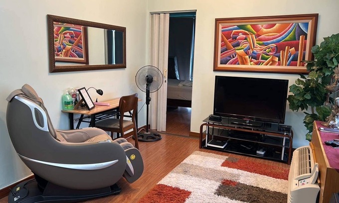 Bagumbayan Condo | An entire and cozy 1 bedroom condo with an awesome view! Massage chair.