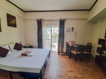 Mactan Export Processing Zone Apartment | ANIA GUEST ROOM with balcony near Mactan Airport.