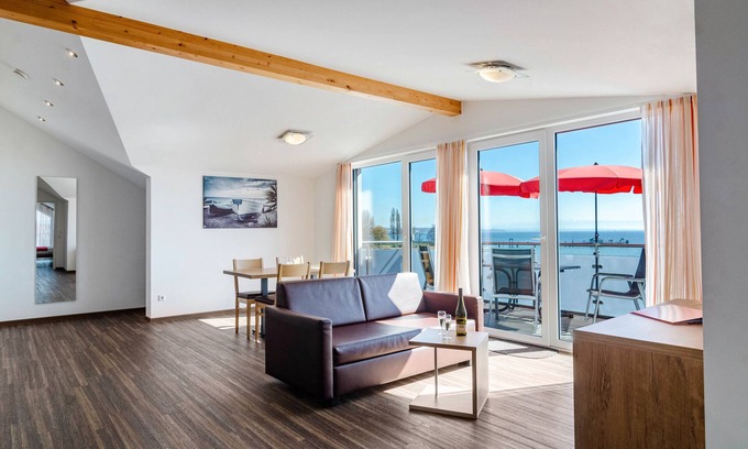 Immenstaad am Bodensee Apartment | Apartment 'Dachstudio' with Shared Terrace, Shared Garden and Wi-Fi