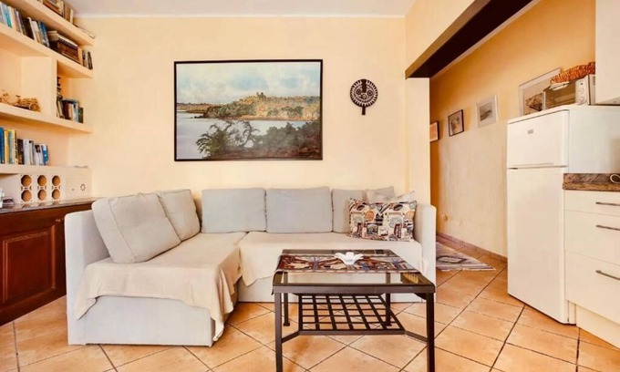 Teguise Resort | Apartment 1 with panoramic window in the bedroom facing the sea and Risco Famara