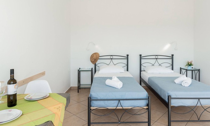 Perivolos House | Apartment "Aegean Blue Santorini Perivolos 1" with Sea View, Shared Terrace & Wi-Fi
