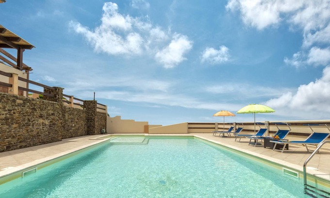 Sassari Apartment | Apartment "Appartamento Tre Posti" with Sea View, Pool, Wi-Fi, Garden & Terrace