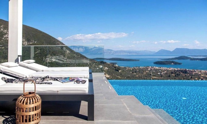 Nidri Apartment | Apartment "Desun Suites Blue" with Sea View, Balcony, Garden and Wi-Fi
