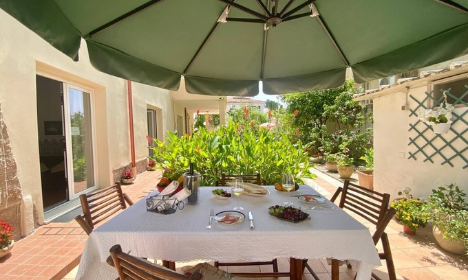 Lido Apartment | Apartment for 4 people facing the beach with garden