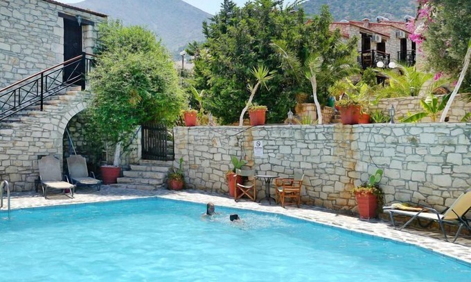 Vlichada Apartment | Apartment in a holiday home