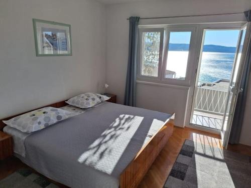 Borak Apartment | Apartment in Omiš with sea view, balcony, air conditioning, Wi-Fi (161-4)