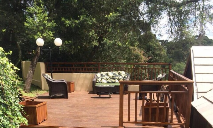 Floresta Apartment | Apartment in the center of Gramado with view, fireplace and hydro bath