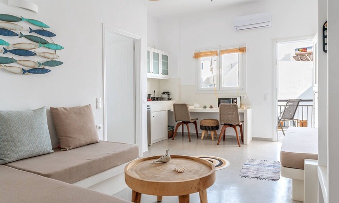 Tinos Apartment | Apartment 'Kleris 4 Tinos' with Shared Terrace, Wi-Fi and Air Conditioning