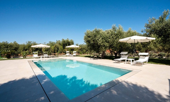 L'Assunta Apartment | Apartment 'L'Aia - 1' with Shared Pool, Wi-Fi and Air Conditioning