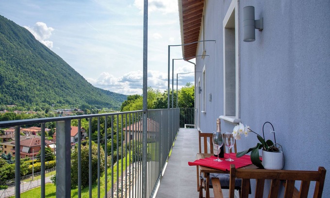 Laveno Apartment | Apartment 'La Fonte Primo Piano' with Mountain View, Shared Garden and Wi-Fi