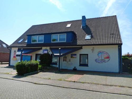 Norddeich Apartment | Apartment Leuchtturm by Interhome