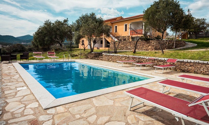 Budoni Apartment | Apartment 'Malamuri 5 Sun Vacanze' with Sea View, Shared Pool and Shared Garden