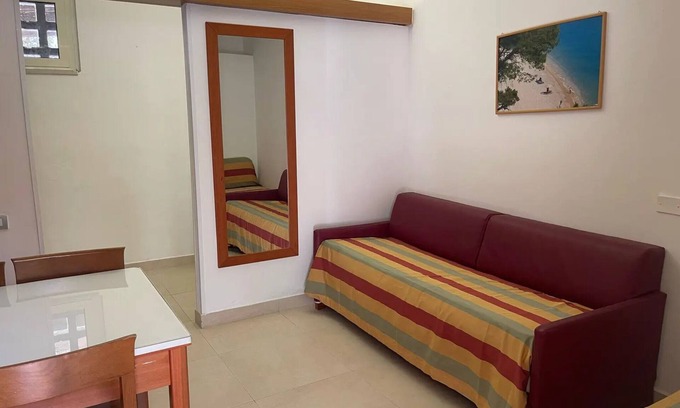 Peschici Apartment | Apartment 'Maritalia 3' with Private Terrace, Private Garden and Air Conditioning
