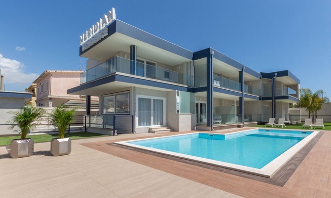 Villa San Pietro Apartment | Apartment "Residence Meridian Unità 4" Near the Beach with Mountain View, Pool, A/C, Wi-Fi & Balcony