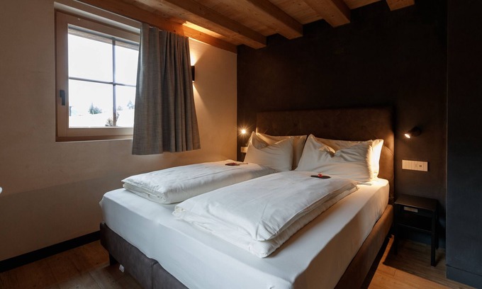 Livigno Ski Chalet | Apartment 'Snow Villa Genf' with Mountain View, Shared Spa Area and Garden