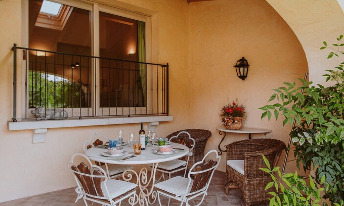 Puegnago del Garda Apartment | Apartment 'Topazio' with Shared Pool, Wi-Fi and Air Conditioning