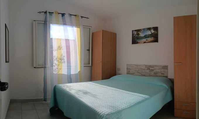 Peschici Apartment | Apartment 'Trilo 2' with Private Terrace, Shared Garden and Wi-Fi