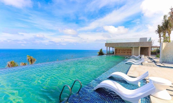 Suoi Nuoc Beach Apartment | Apec Mandala Mũi Né with Infinity Pool
