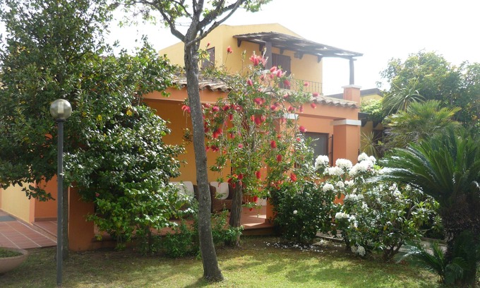 Arbatax Villa | arbatax tortoli: elegant and prestigious villa with green lawn and flowers