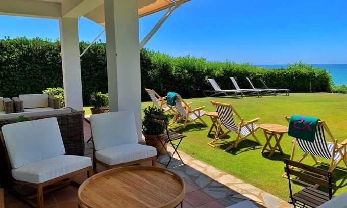 Cabo Roche Villa | Arena, where the garden meets the dunes.