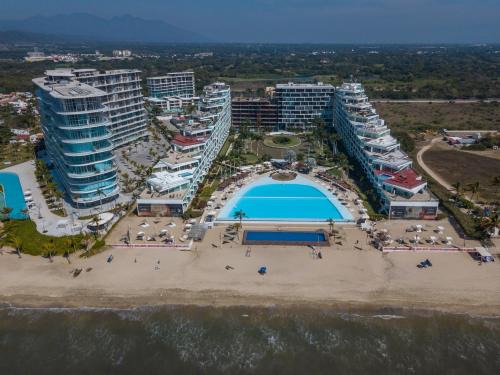 Flamingos Hotel | Aria Ocean Condominios